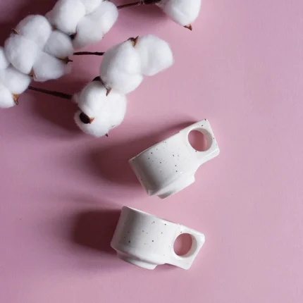 porcelanowa filizanka espresso | espresso porcelain cup | ceramika handmade inspirowana naturą | nordic inspired handmade ceramics | ręcznie robiona ceramika artystyczna | handmade ceramics inspired by the sea | ceramika inspirowana nordyckim wybrzeżem | nordic coastal ceramics | ceramika inspirowana oceanem | ceramics inspired by northern landscapes | unikatowa ceramika handmade | slow design handmade ceramics | ceramika z naturalną fakturą | textured handmade ceramics | ceramika użytkowa handmade | functional handmade ceramics | ceramika inspirowana lofotami | nordic sea inspired ceramics | nowa kolekcja ceramiki handmade | artisanal ceramic collection | ceramika z duszą | ceramics made slowly by hand | pantone cloud dancer | vogue living