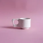 porcelanowa filizanka espresso | espresso porcelain cup | ceramika handmade inspirowana naturą | nordic inspired handmade ceramics | ręcznie robiona ceramika artystyczna | handmade ceramics inspired by the sea | ceramika inspirowana nordyckim wybrzeżem | nordic coastal ceramics | ceramika inspirowana oceanem | ceramics inspired by northern landscapes | unikatowa ceramika handmade | slow design handmade ceramics | ceramika z naturalną fakturą | textured handmade ceramics | ceramika użytkowa handmade | functional handmade ceramics | ceramika inspirowana lofotami | nordic sea inspired ceramics | nowa kolekcja ceramiki handmade | artisanal ceramic collection | ceramika z duszą | ceramics made slowly by hand | pantone cloud dancer | vogue living