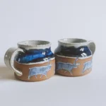 ceramika handmade inspirowana naturą | nordic inspired handmade ceramics | ręcznie robiona ceramika artystyczna | handmade ceramics inspired by the sea | ceramika inspirowana nordyckim wybrzeżem | nordic coastal ceramics | ceramika inspirowana oceanem | ceramics inspired by northern landscapes | unikatowa ceramika handmade | slow design handmade ceramics | ceramika z naturalną fakturą | textured handmade ceramics | ceramika użytkowa handmade | functional handmade ceramics | ceramika inspirowana lofotami | nordic sea inspired ceramics | nowa kolekcja ceramiki handmade | artisanal ceramic collection | ceramika z duszą | ceramics made slowly by hand